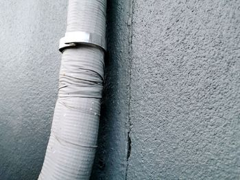 Close-up of pipe on wall