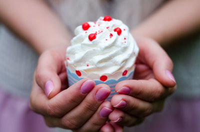 Close up of cupcake bath bomb in hands 