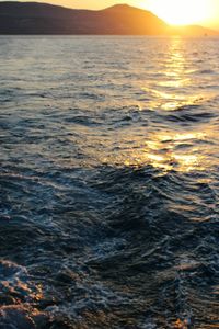 View of calm sea at sunset