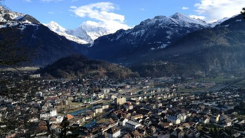 Aerial view of cityscape and mountains