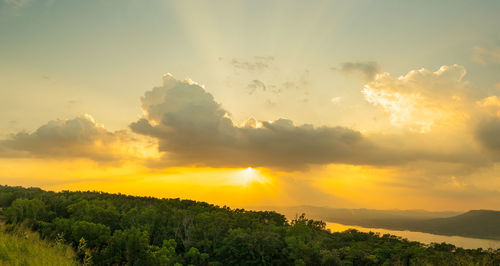 Scenic view of landscape against sky during sunset