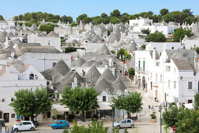 Panoramic view of trulli typical houses with conical roof in alberobello old town, apulia, italy