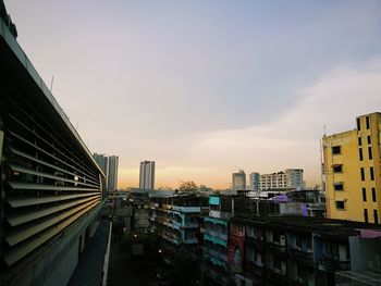 High angle view of buildings in city against sky