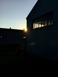 Building exterior at sunset