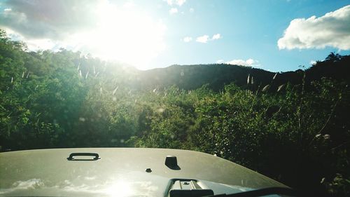 Car against sky on sunny day