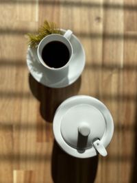 High angle view of coffee cup on table