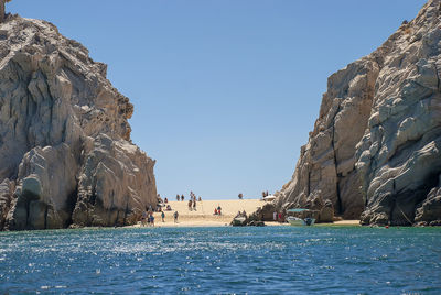 Scenic view of sea against clear blue sky