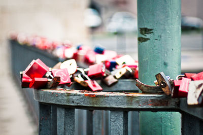 Close-up of padlocks on railing