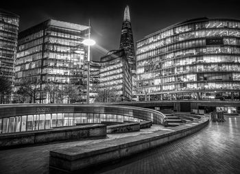 Modern buildings in city at night