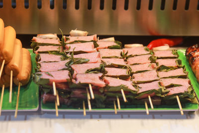 Grill sour meatball in ho thi ky street, ho chi minh city