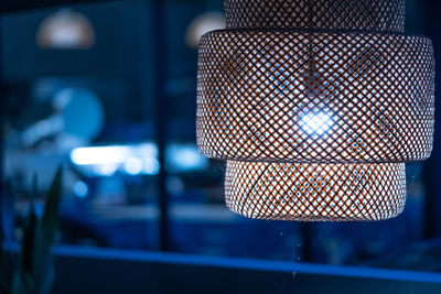 Close-up of illuminated electric lamp