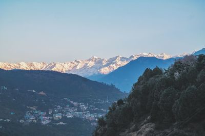 Scenic view of snowcapped mountains against sky
