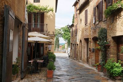 Narrow alley amidst buildings in town