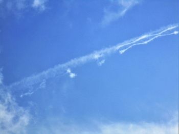 Low angle view of vapor trail in sky