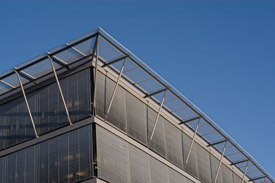 Low angle view of building against clear blue sky