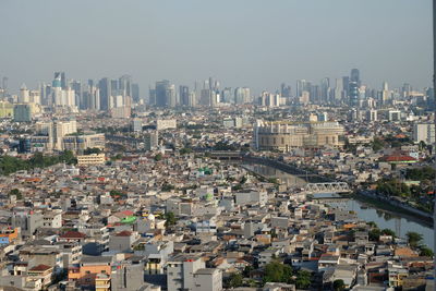 High angle view of buildings against clear sky