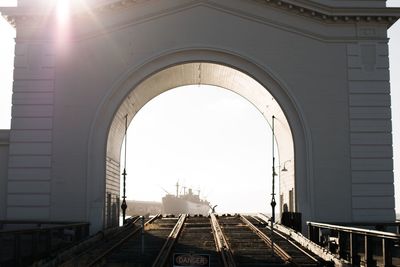 Ship seen through arch at dock