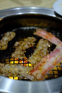 High angle view of meat in cooking pan