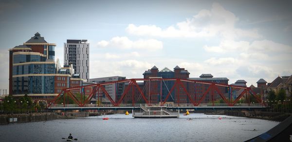 Buildings in city against sky