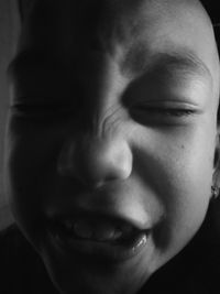 Close-up portrait of smiling boy