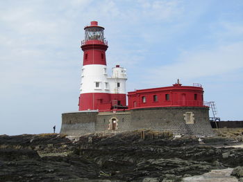 Low angle view of lighthouse against sky