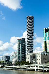 Low angle view of buildings against sky in city