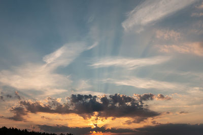 Low angle view of dramatic sky during sunset