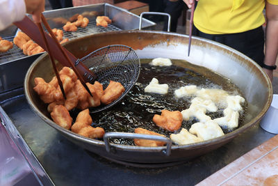 Close-up of meat in cooking pan