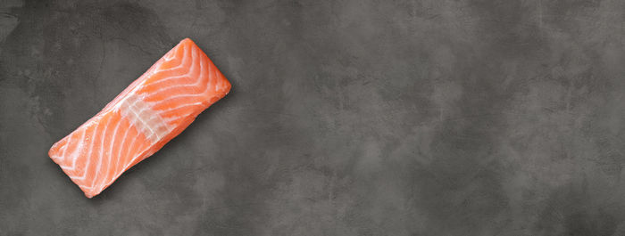 Directly above shot of orange on white surface