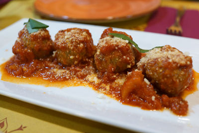 Close-up of served food in plate