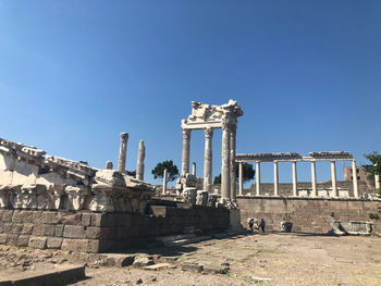 Low angle view of historical helenic building in pergamon/turkey/bergama against clear blue sky 