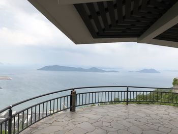 Scenic view of sea and mountains against sky