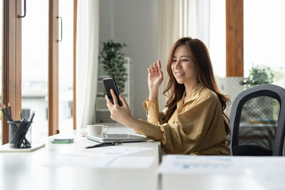 Businesswoman working at office