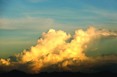 Low angle view of dramatic sky during sunset