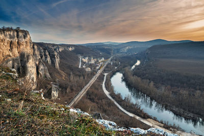 Panoramic view of landscape against cloudy sky