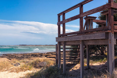 Cropped built structure against calm sea