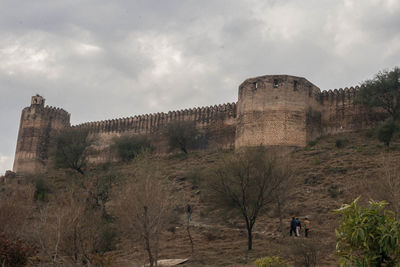 Low angle view of fort against sky