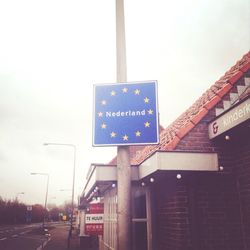 Low angle view of information sign