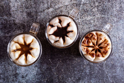 Assortment of mini chocolate desserts in the glass. mini choloate desserts on a rustic background