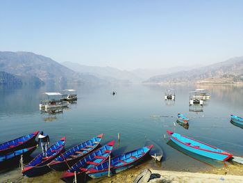 High angle view of boats moored in water