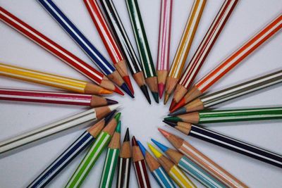 High angle view of multi colored pencils on table