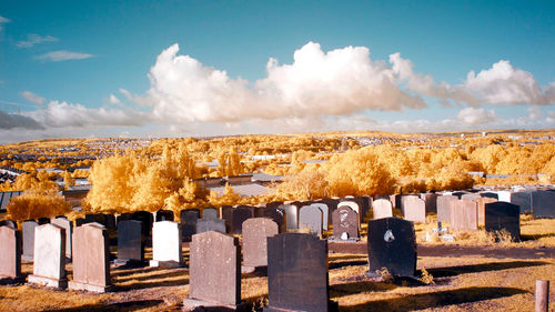 Panoramic view of cemetery against sky