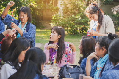 Group of people enjoying music outdoors