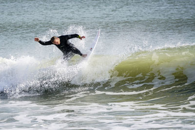 Man surfing in sea