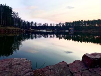 Scenic view of lake against sky during sunset