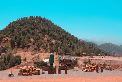 Scenic view of mountains against clear blue sky