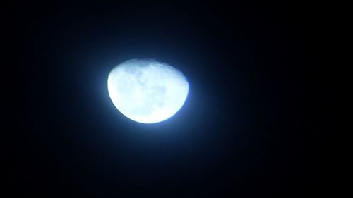 Low angle view of moon in sky