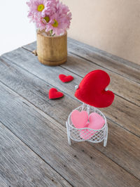 High angle view of pink flower on table