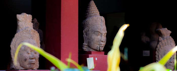 Close-up of buddha statue in temple