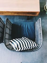 High angle view of chairs on table at home